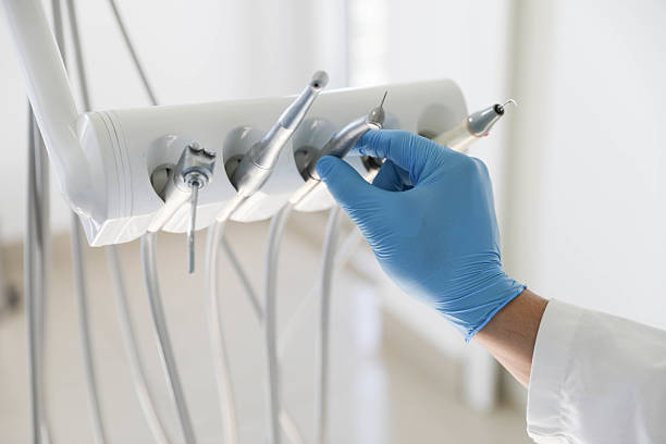 Professional Root Canal Treatment technician working in Bastrop, LA
